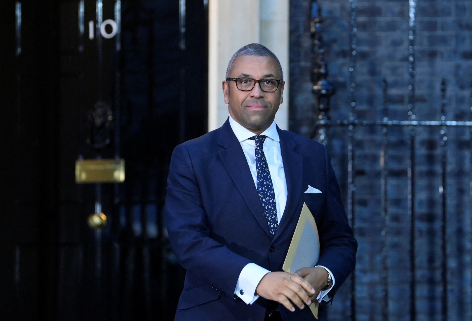 New British Foreign Secretary James Cleverly walks outside Number 10 Downing Street in London - REUTERS