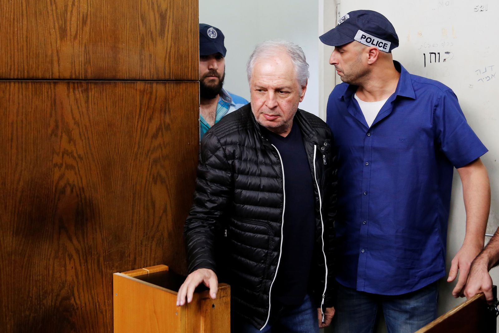 شاؤول إلوفيتش يمثل أمام محكمة الصلح قبل جلسة الحبس الاحتياطي في تل أبيب. 2018 - REUTERS