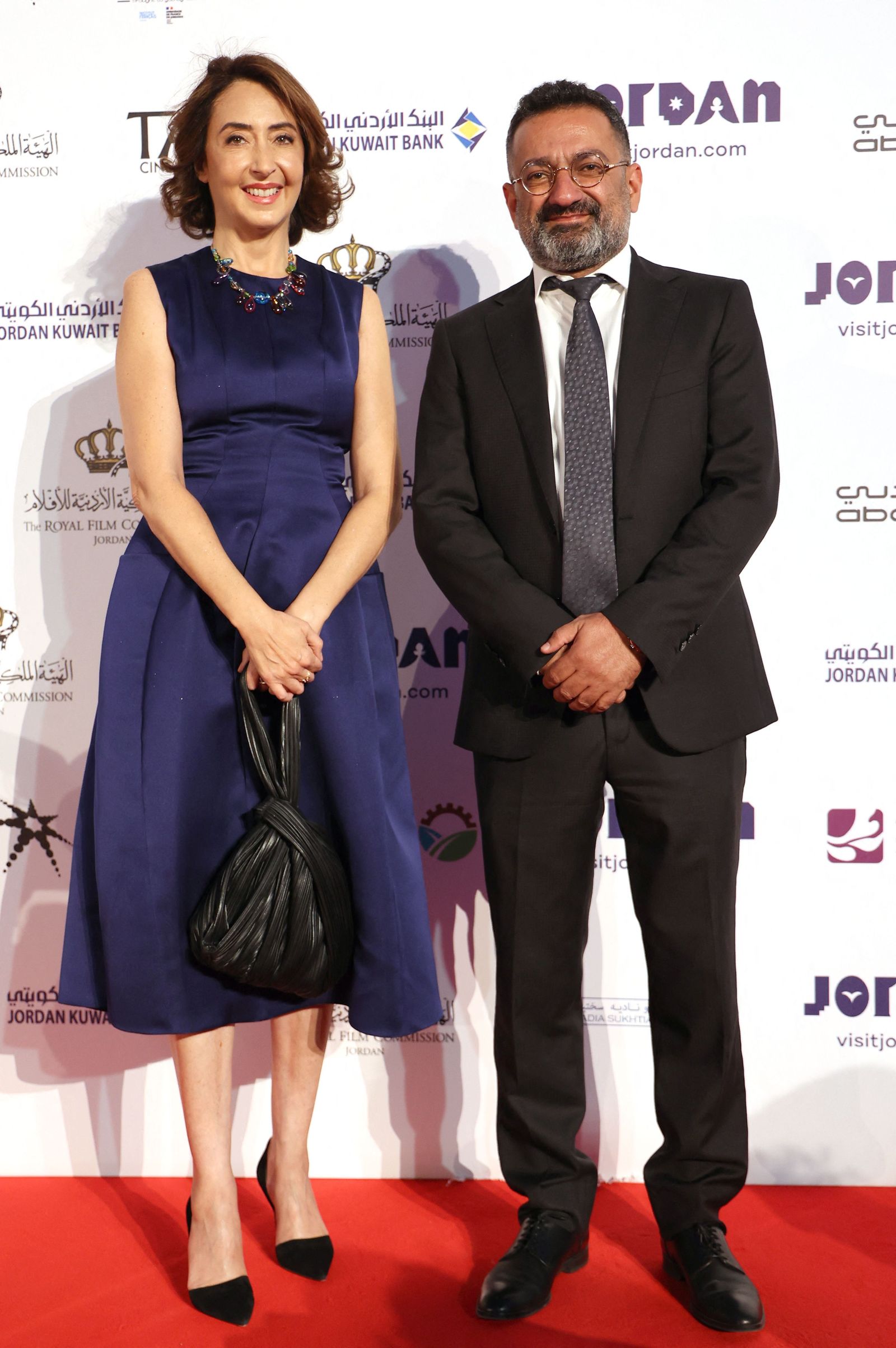 جورج خباز مع الأميرة ريم علي في افتتاح الدورة الثالثة لمهرجانعمان السينمائي - AFP