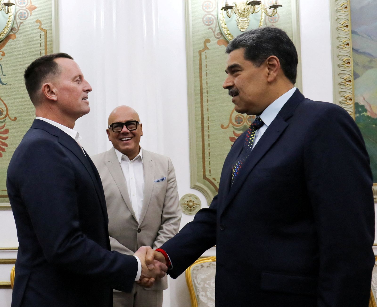 FILE PHOTO: Venezuela's President Nicolas Maduro and U.S. President Donald Trump's envoy Richard Grenell shake hands at the Miraflores Palace, in Caracas, Venezuela January 31, 2025. Miraflores Palace/Handout via REUTERS ATTENTION EDITORS - THIS IMAGE HAS BEEN SUPPLIED BY A THIRD PARTY/File Photo
