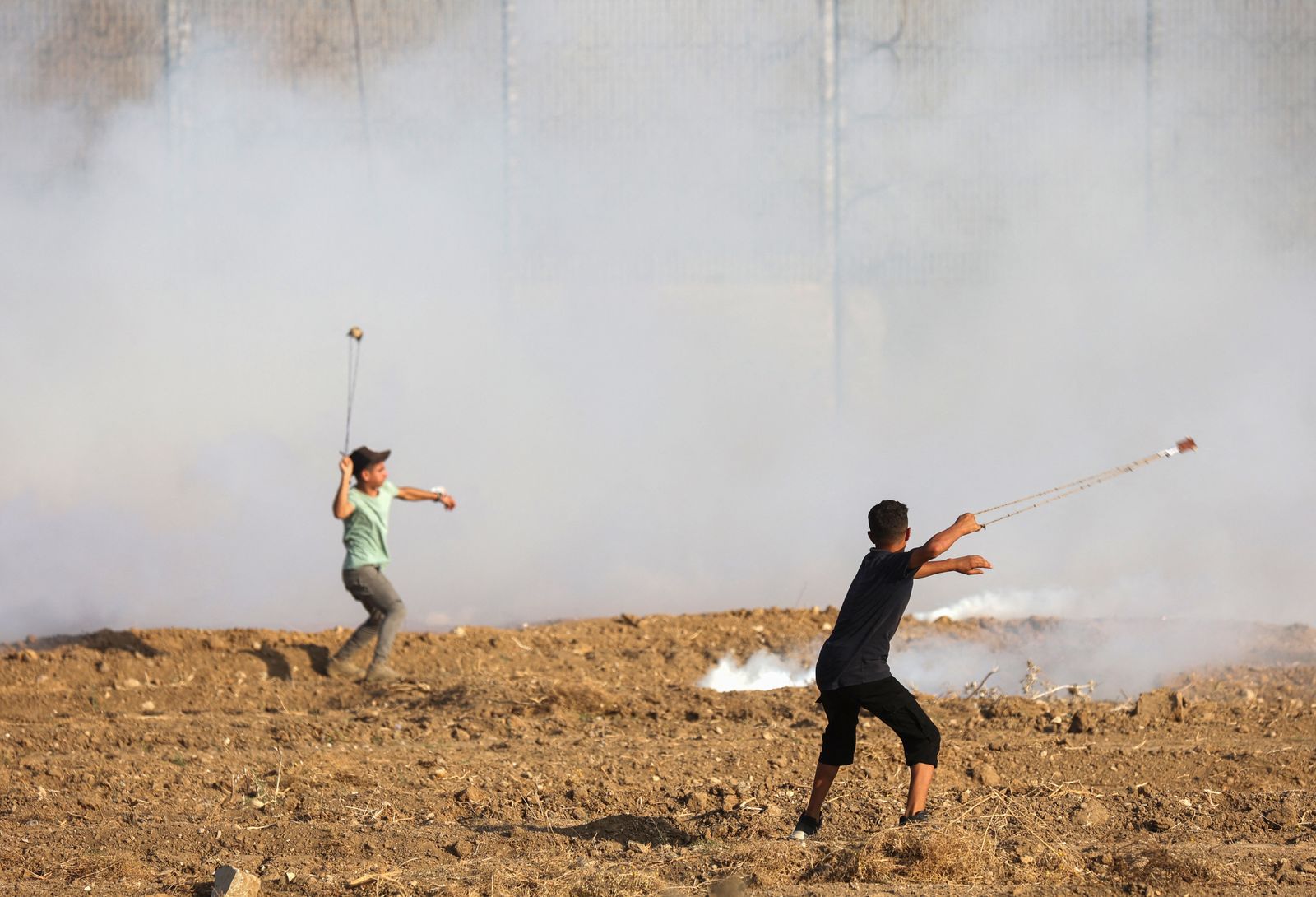 مواجهات بين متظاهرين فلسطينيين في قطاع غزة والقوات الإسرائيلية - 21 أغسطس 2021 - AFP