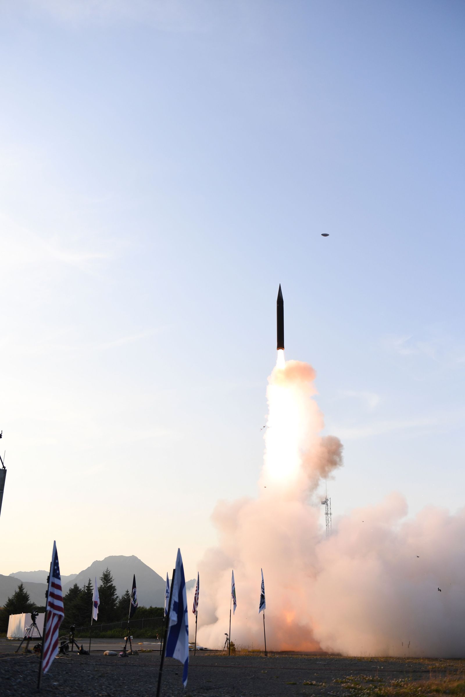 (FILES) A handout picture released by the Israeli Ministry of Defence on July 28, 2019 shows the launch of the Arrow-3 hypersonic anti-ballistic missile at an undisclosed location in Alaska. The Arrow 3 system -- designed to shoot down ballistic missiles above the Earth's atmosphere -- is jointly developed and produced by Israel and the United States. (Photo by Israeli Ministry of Defence / AFP) / == RESTRICTED TO EDITORIAL USE - MANDATORY CREDIT 'AFP PHOTO / HO / ISRAELI MINISTRY OF DEFENCE' - NO MARKETING NO ADVERTISING CAMPAIGNS - DISTRIBUTED AS A SERVICE TO CLIENTS ==