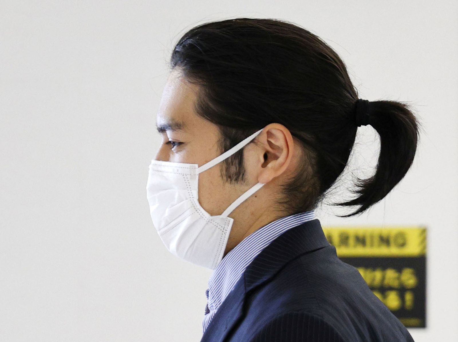 Kei Komuro, the boyfriend of Japanese Princess Mako, arrives at Narita airport in Narita - REUTERS
