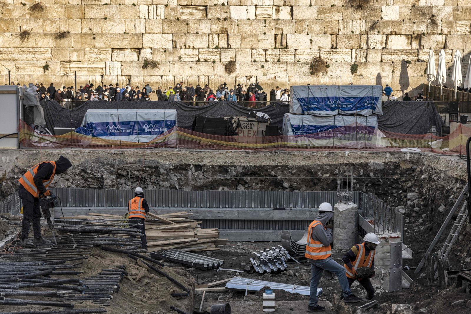 (FILES) This file photo taken on January 15, 2023 shows a view of construction works conducted by the Western Wall Heritage Foundation to build an underground floor at the Plaza of the Western Wall, the holiest site where Jews are allowed to pray, in the Old City of Jerusalem. - At Jerusalem's Western Wall plaza, a recent excavation has alarmed some heritage specialists who fear the traces of the centuries-old al-Mughrabi Arab neighbourhood, or Moroccan quarter, razed by Israel may disappear. (Photo by MENAHEM KAHANA / AFP) - AFP