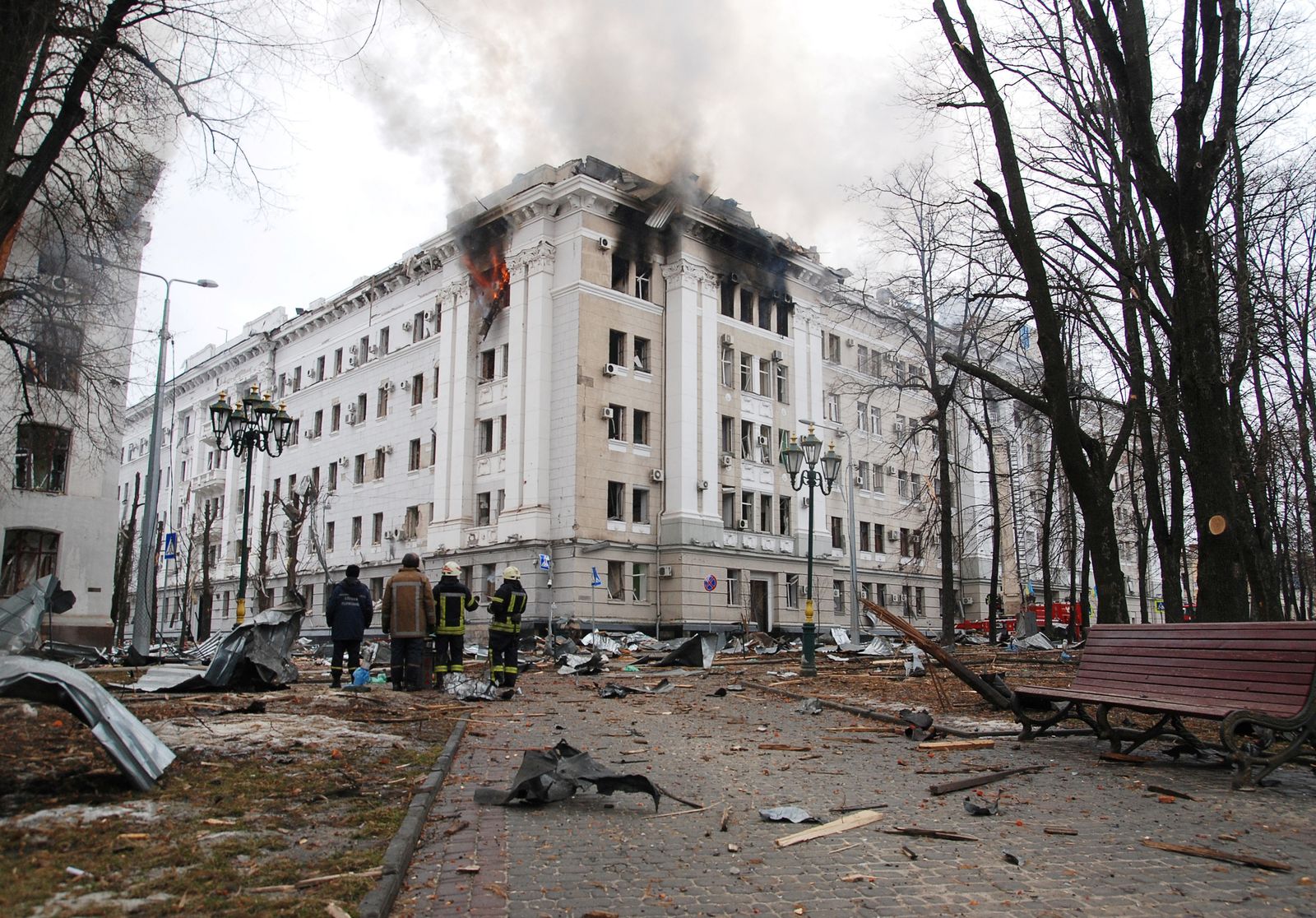 Flames and smoke billows from a damaged regional police department building in Kharkiv - REUTERS