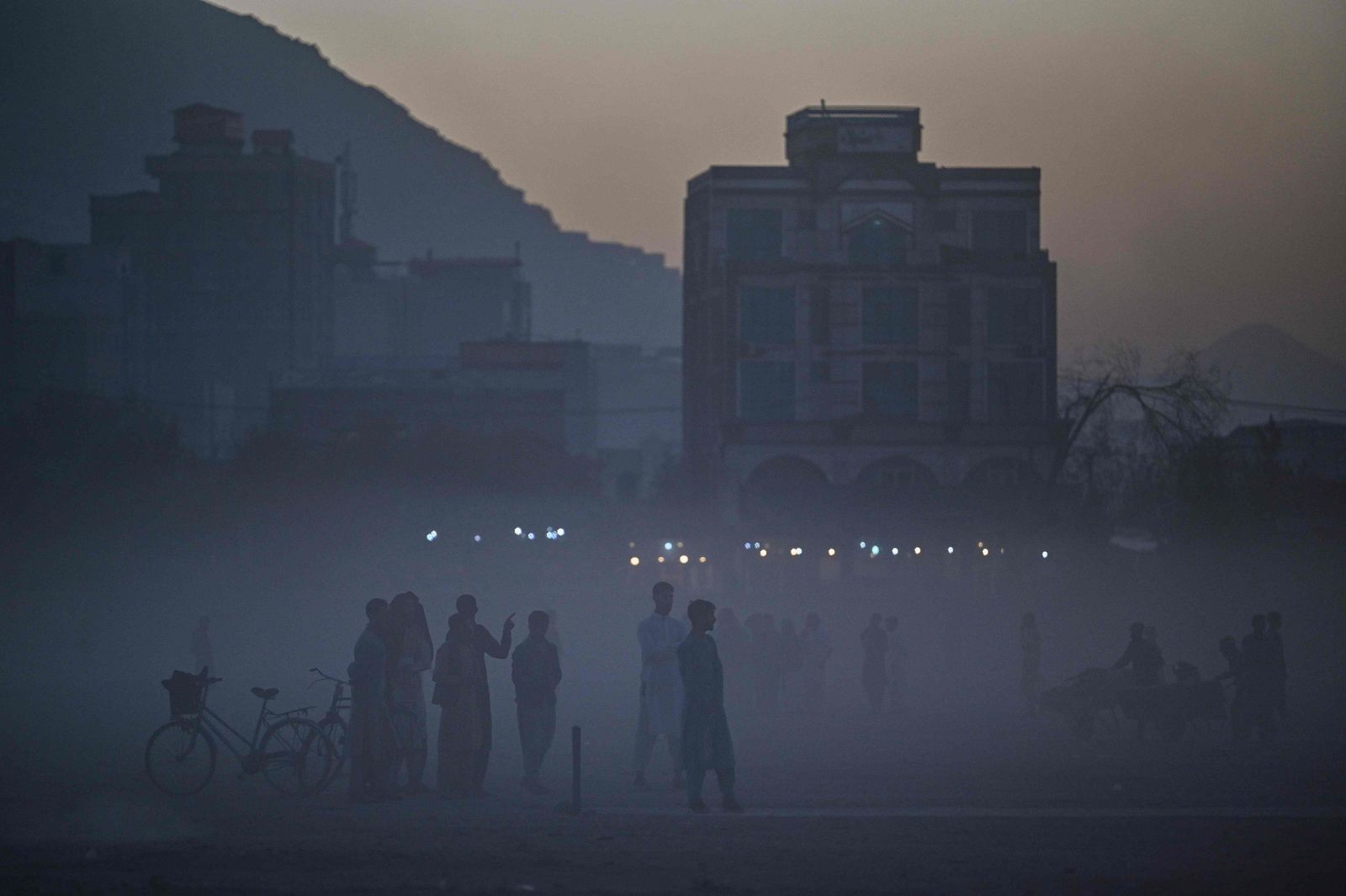 Afghan youth gather to play at Chaman-e-Hozori park in Kabul City, on November 12, 2021. (Photo by Hector RETAMAL / AFP) - AFP