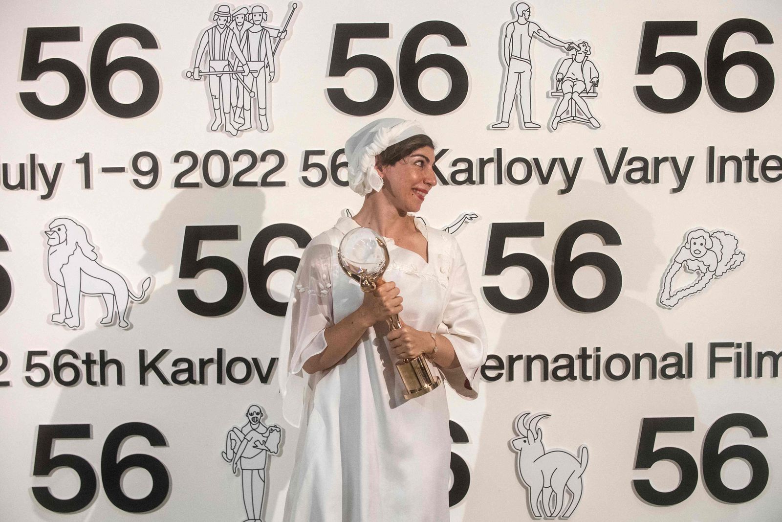 Iranian film director Sarah Foroughi poses after receiving the Grand Prix Crystal Globe for Best film 