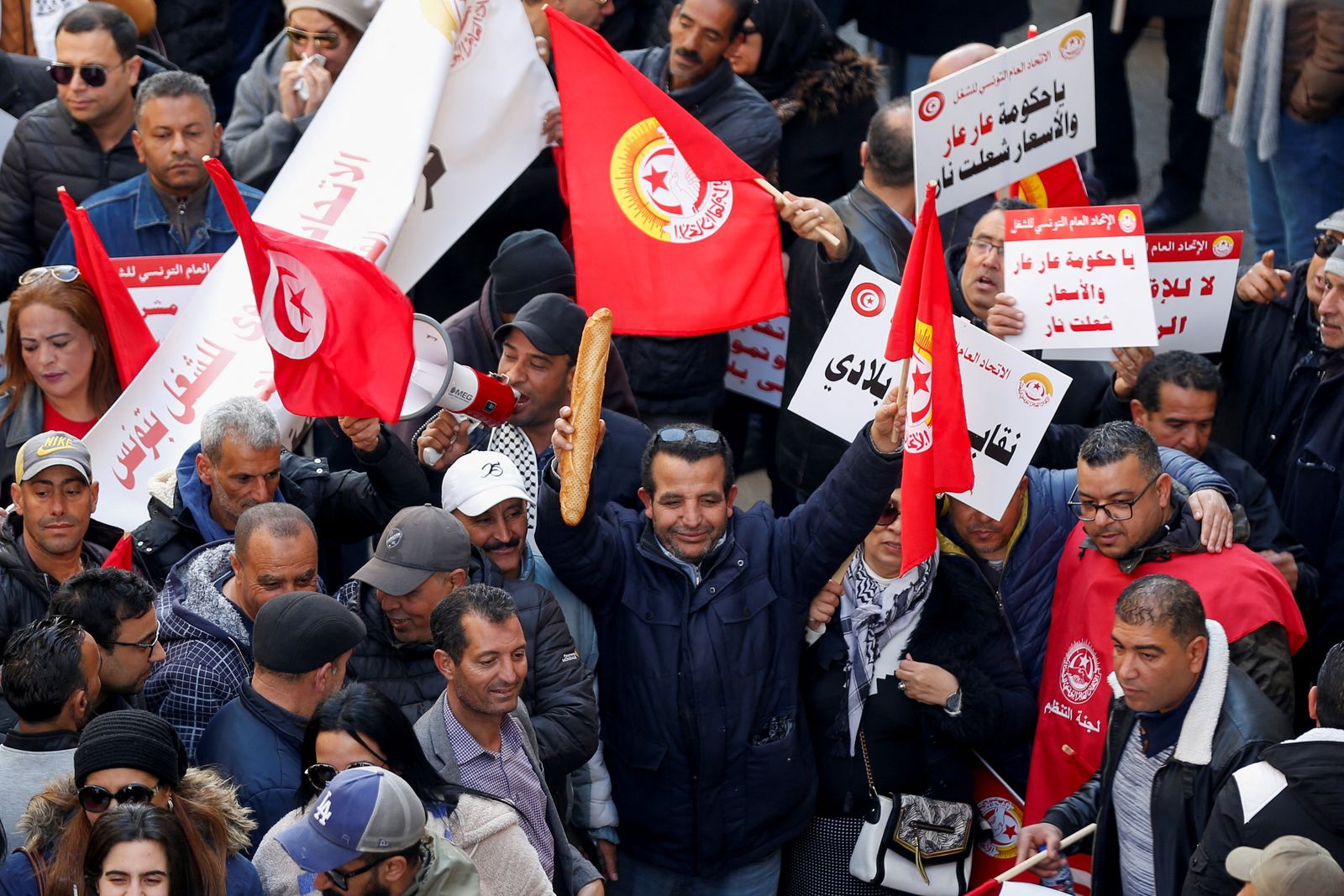 Supporters of the Tunisian General Labour Union (UGTT) protest in Tunis - REUTERS