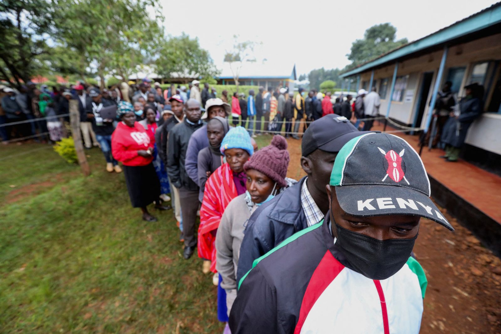 People line up to cast their votes during the general elections, at Kosachei Primary School - REUTERS