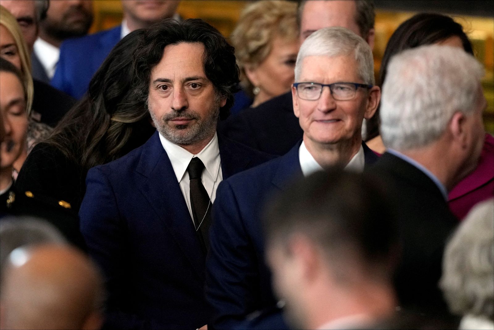 Apple CEO Tim Cook attends the 60th Presidential Inauguration in the Rotunda of the U.S. Capitol in Washington, Monday, Jan. 20, 2025.      Julia Demaree Nikhinson/Pool via REUTERS