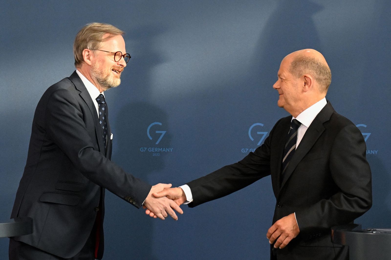 German Chancellor Olaf Scholz (R) and Czech Prime Minister Petr Fiala shake hands after addressing a press conference at the Chancellery in Berlin on May 5, 2022. (Photo by Tobias SCHWARZ / AFP) - AFP