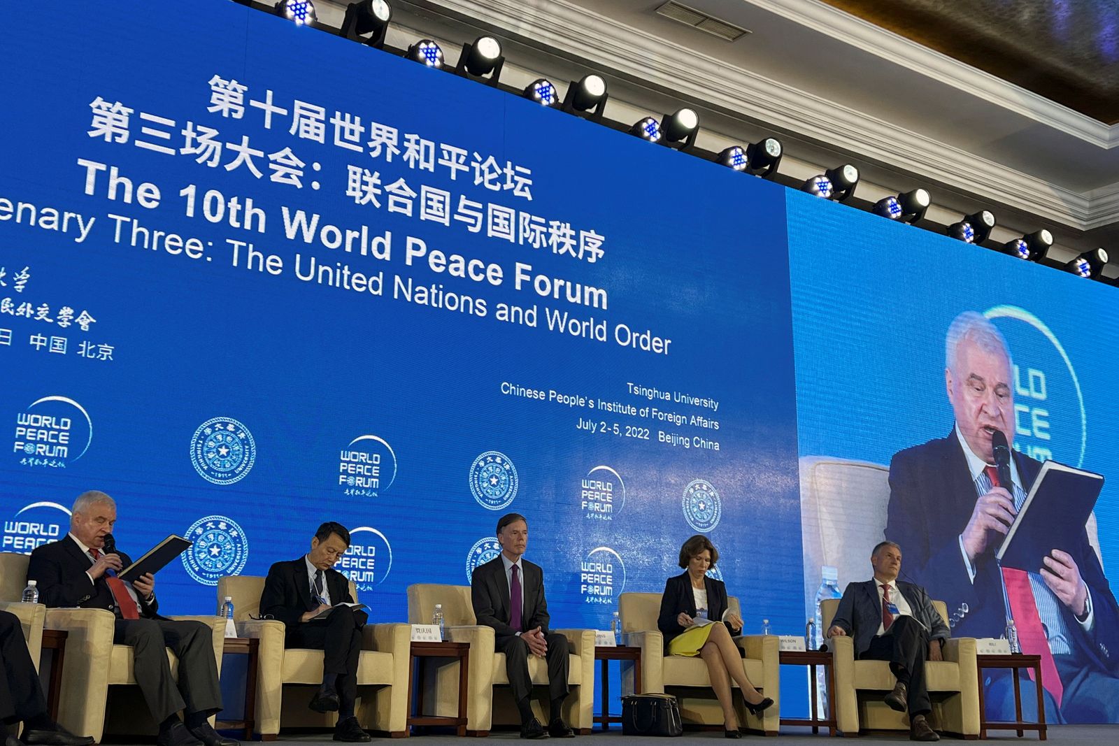 Russian Ambassador to China Andrey Denisov speaks next to Chinese professor Jia Qingguo, U.S. Ambassador to China Nicholas Burns, British Ambassador to China Caroline Wilson and French Ambassador to China Laurent Bili at the World Peace Forum at Tsinghua University in Beijing, China July 4, 2022. REUTERS/Yew Lun Tian - REUTERS