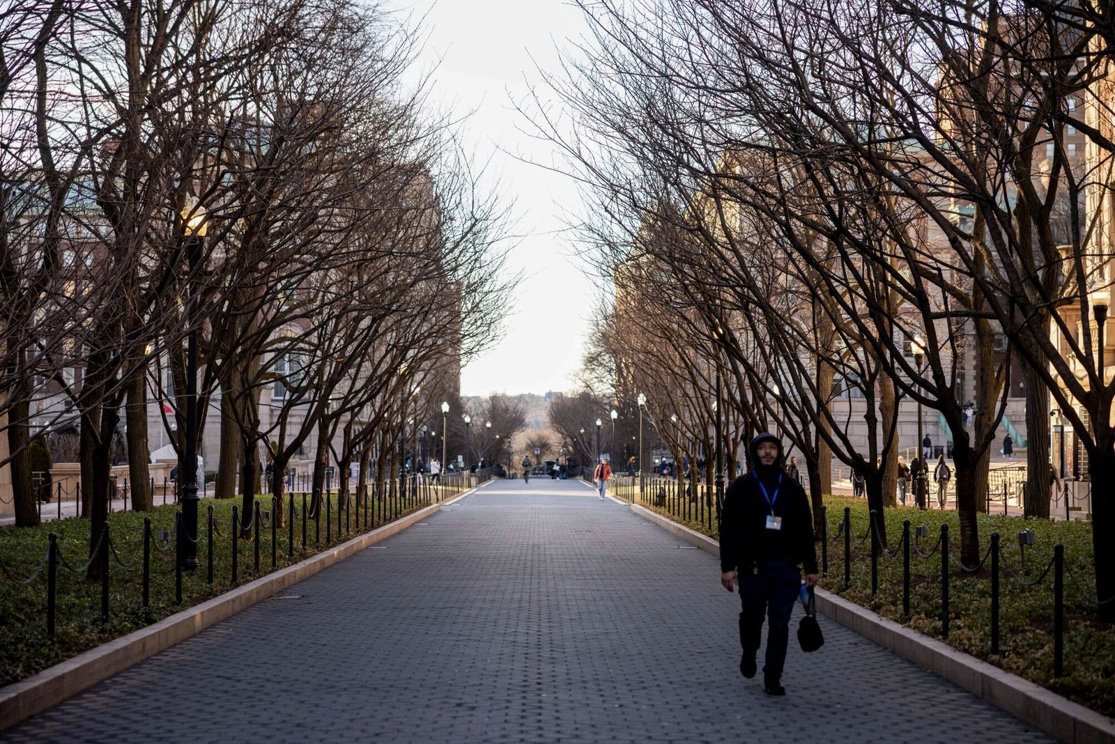 A pedestrian at Columbia University in New York, US, on Friday, March 7, 2025. The Trump Administration said it is canceling $400 million of federal grants and contracts to Columbia University, citing civil rights complaints against the Ivy League school by Jewish students. Photographer: Yuki Iwamura/Bloomberg