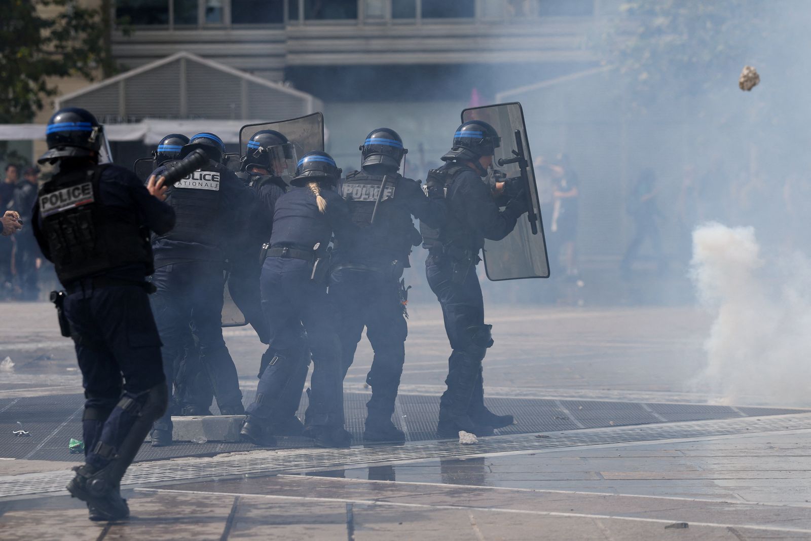 French police in riot gear move towards the crowd as a hurled object flies towards them during a demonstration, as part of a grassroots protest movement called 'Bloquons Tout' ('Let's Block Everything') calling for nationwide all-day disruption, in Montpellier, France, September 10, 2025. REUTERS/Manon Cruz