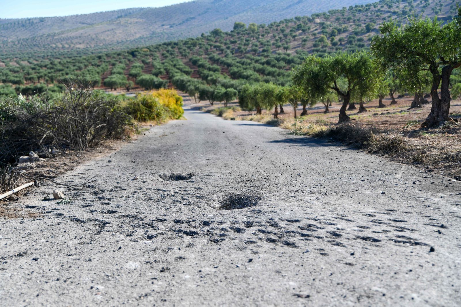 A picture shows site where a US drone targeted Maher al-Agal, a leader in the Islamic State militant group, near the village of Khaltan, near Jindires in northern Syria, on July 12, 2022. - A man US officials called the leader of the Islamic State militant group in Syria was killed Tuesday in a drone strike, the Pentagon said. Maher al-Agal was killed while riding a motorcycle near Jindires in northern Syria, and one of his top aides was 