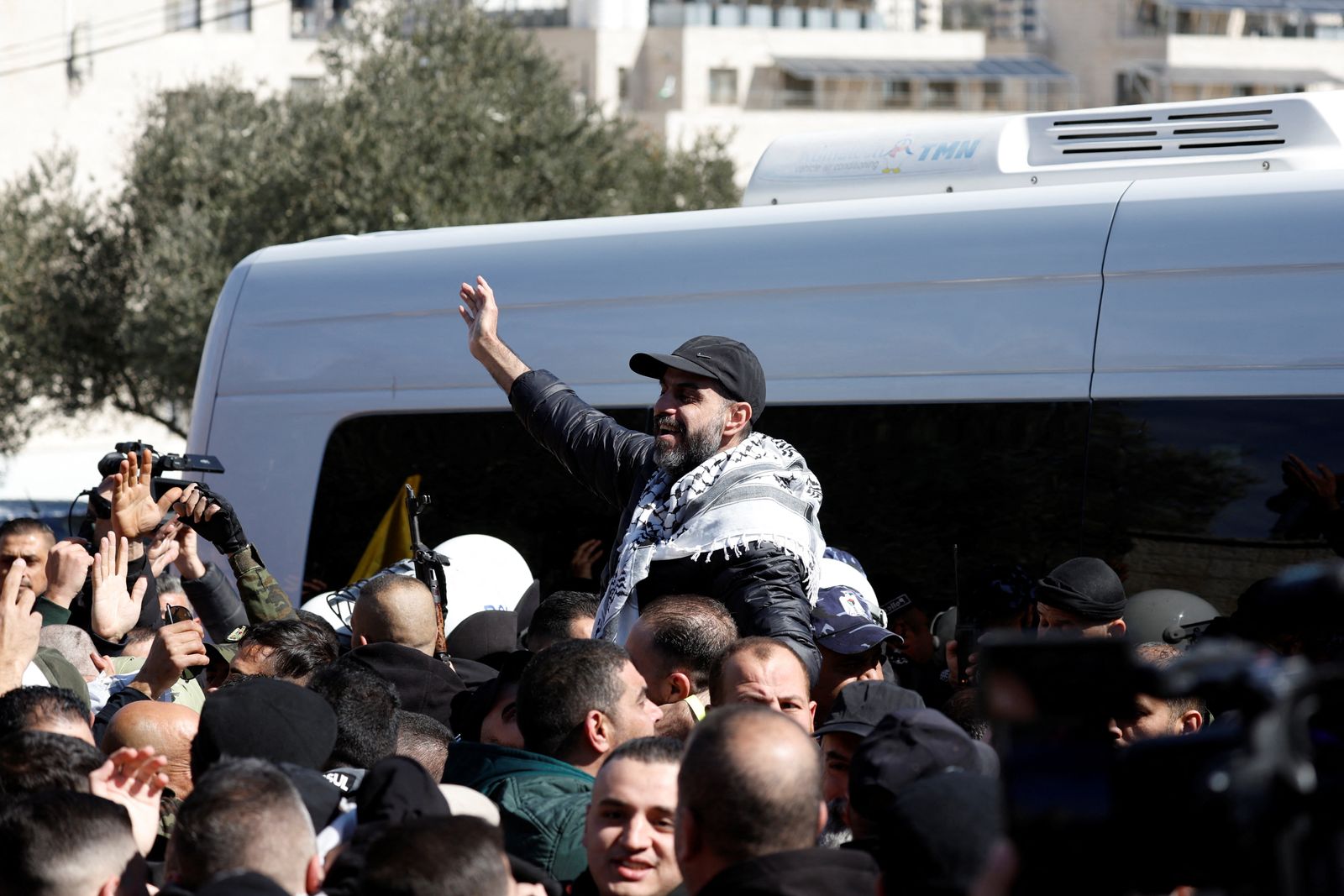 A freed Palestinian prisoner is greeted after being released from an Israeli jail as part of a hostages-prisoners swap and a ceasefire deal in Gaza between Hamas and Israel, in Ramallah, in the Israeli-occupied West Bank, February 15, 2025. REUTERS/Mohammed Torokman