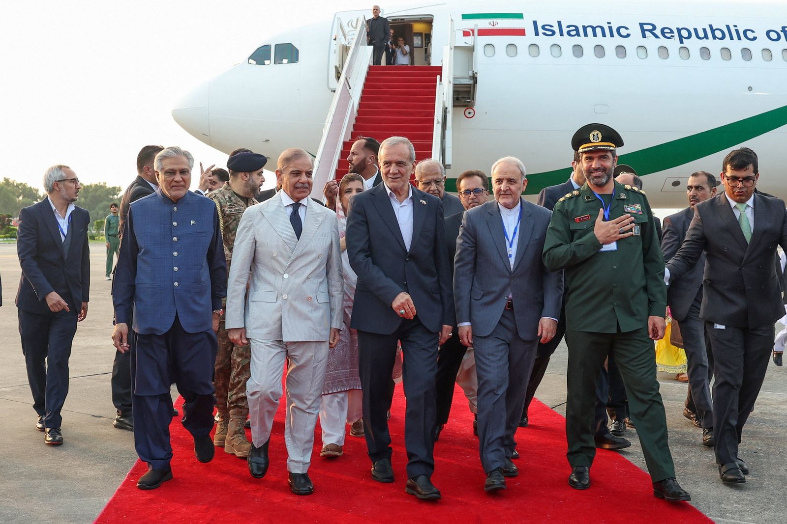 Iranian President Masoud Pezeshkian is welcomed by Pakistani Prime Minister Shehbaz Sharif in Islamabad, Pakistan, August 2, 2025. Iran's Presidential website/WANA (West Asia News Agency)/Handout via REUTERS ATTENTION EDITORS - THIS PICTURE WAS PROVIDED BY A THIRD PARTY