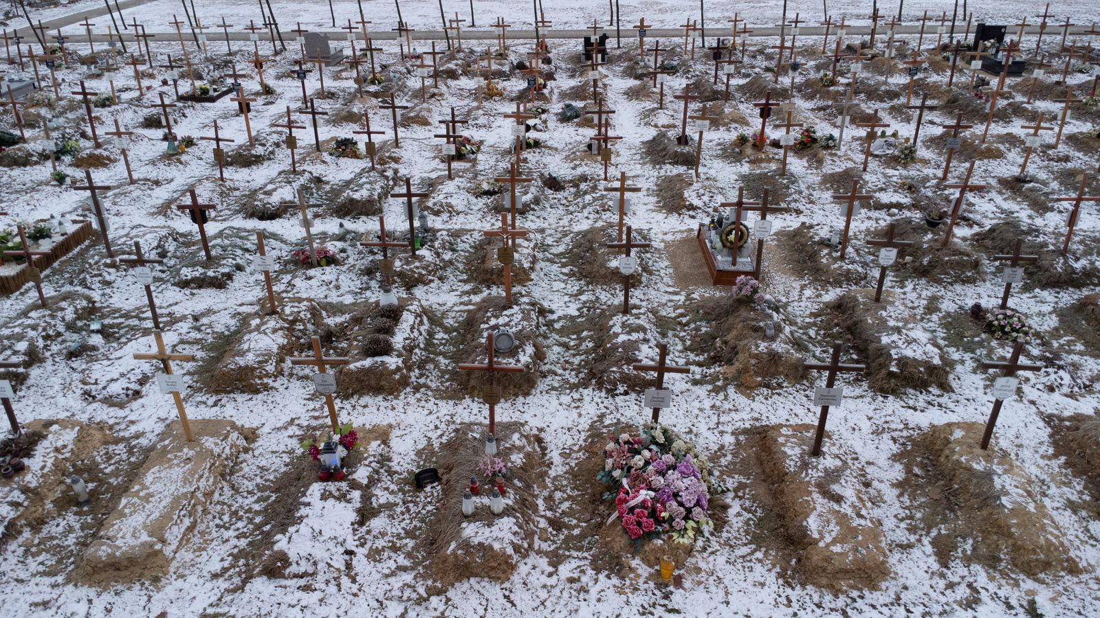 Bird's eye view of the new graves at the cemetery, amid the coronavirus disease (COVID-19) pandemic, in Antoninow - REUTERS
