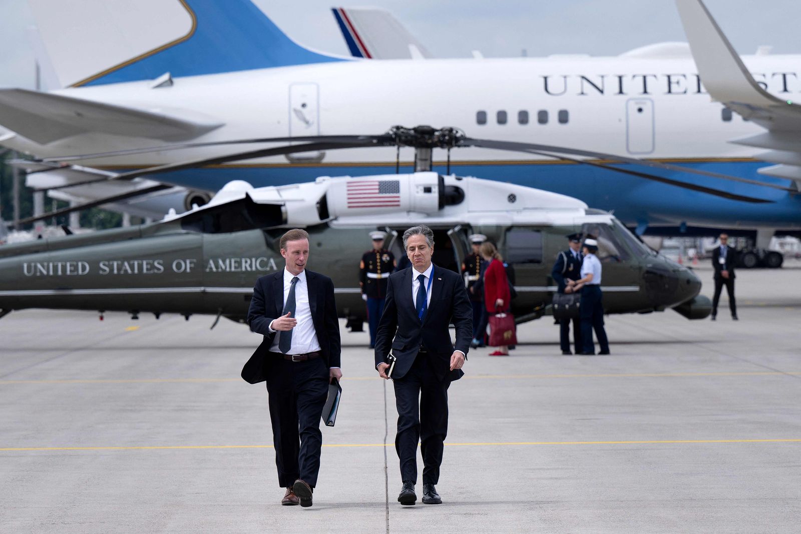 US National Security Advisor Jake Sullivan (L) and US Secretary of State Antony Blinken speak as they walk to Air Force One at Munich Airport in Munich on June 28, 2022, after a G7 summit and enroute to Madrid for a NATO summit. (Photo by Brendan Smialowski / AFP) - AFP