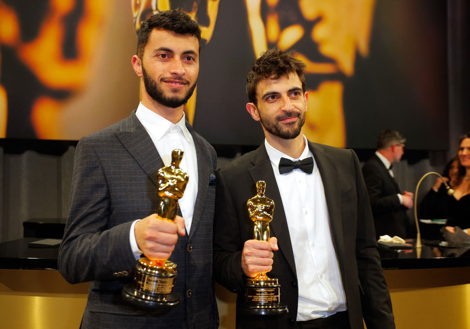 Basel Adra and Yuval Abraham pose with the Oscar for Best Documentary Feature Film for 'No Other Land' at the Governors Ball following the Oscars show at the 97th Academy Awards in Hollywood, Los Angeles, California, U.S., March 2, 2025. REUTERS/Mike Blake