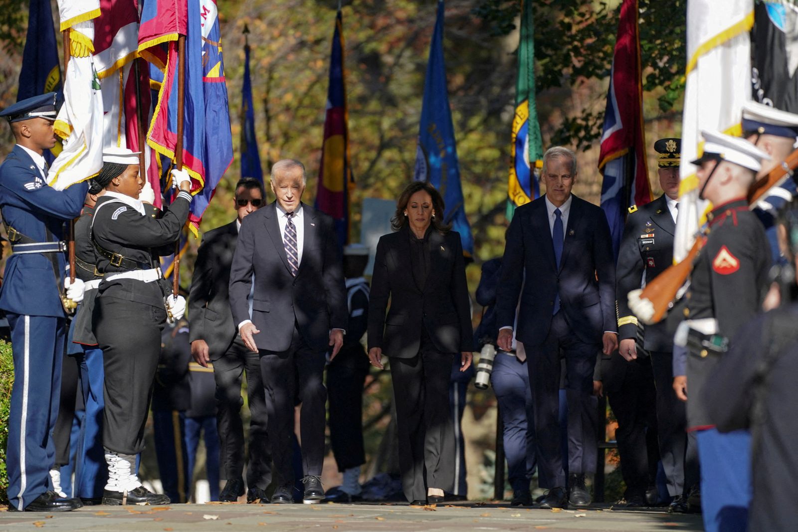 U.S. President Joe Biden, U.S. Vice President Kamala Harris and U.S. Secretary of Veterans Affairs Denis McDonough attend a wreath laying ceremony on Veterans Day at Arlington National Cemetery in Arlington, Virginia, U.S., November 11, 2024. REUTERS/Nathan Howard