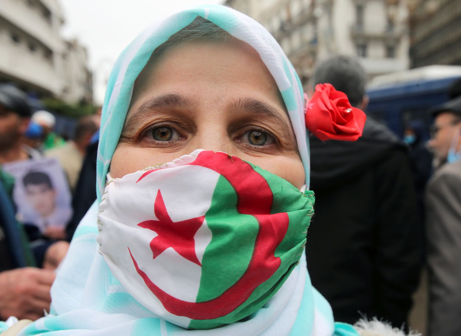 Demonstrators take part in a protest in Algiers - REUTERS