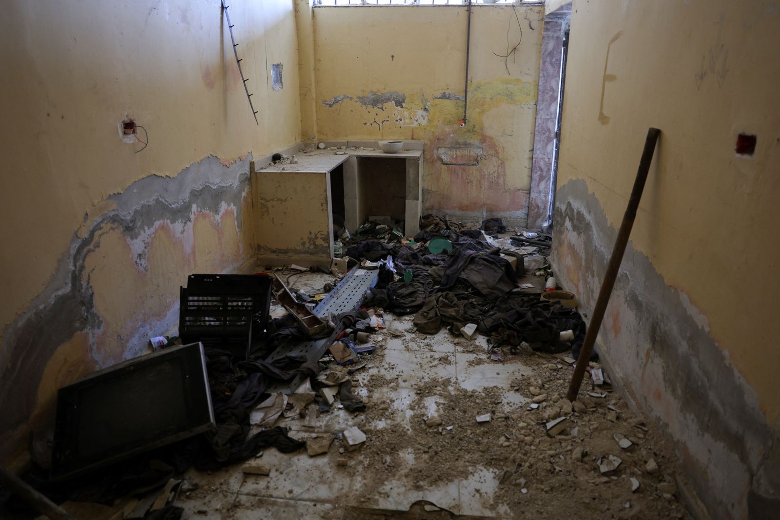 Belongings are scattered on the floor inside the Sednaya prison, which was known as a slaughterhouse under Syria's Bashar al-Assad rule, after fighters of the ruling Syrian body ousted Bashar al-Assad, in Sednaya, Syria December 16, 2024. REUTERS/Amr Abdallah Dalsh