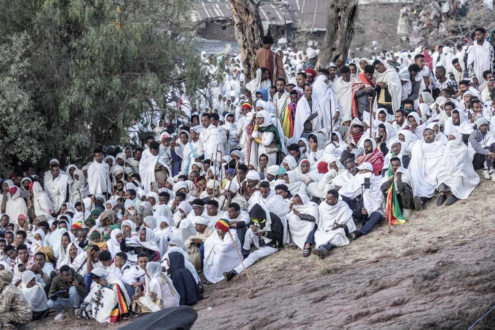 Pilgrims attend the celebration of Genna, the Ethiopian Orthodox Christmas, at Saint Mary's Church in Lalibela, on January 7, 2023. (Photo by Amanuel Sileshi / AFP) - AFP