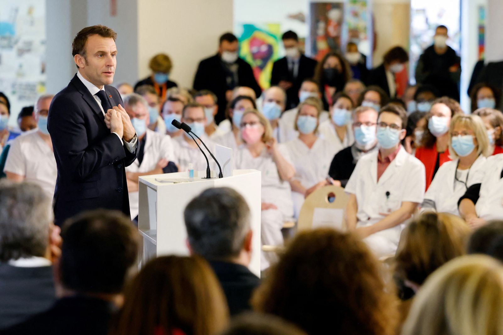 French President Emmanuel Macron addresses New Year wishes to health care workers - REUTERS