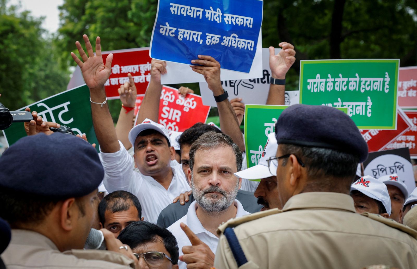 Rahul Gandhi, lawmaker and leader of India's main opposition Congress party, is stopped by police along with other lawmakers during a protest against what they say are electoral malpractices, in New Delhi, India, August 11, 2025. REUTERS/Adnan Abidi