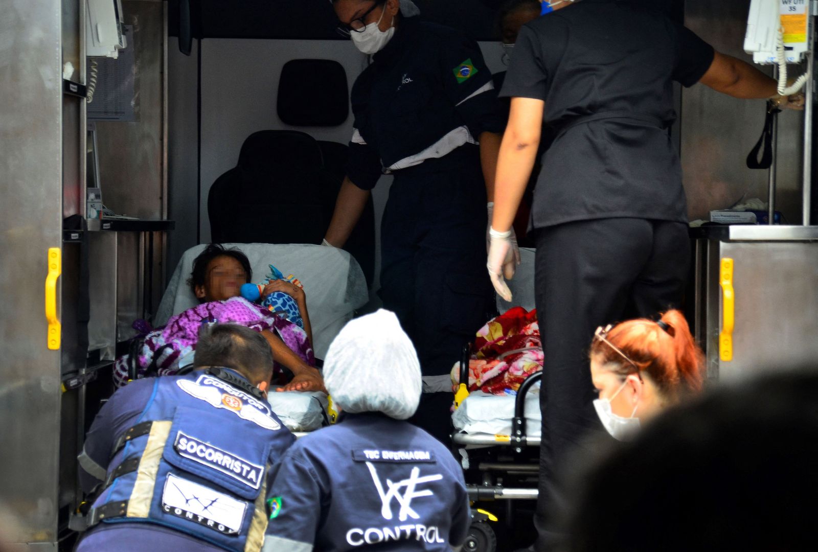 Gleison, 9, arrives at a hospital, in Manaus, Amazonas state, Brazil, on March 17, 2022, after being lost with his brother in the Amazon rainforest for 25 days. - Two Brazilian indigenous boys aged seven and nine have been found after surviving 25 days lost in the Amazon rainforest, where they ate fruit and drank rainwater to stay alive, officials said Friday. (Photo by JUNIO MATOS / AFP) - AFP