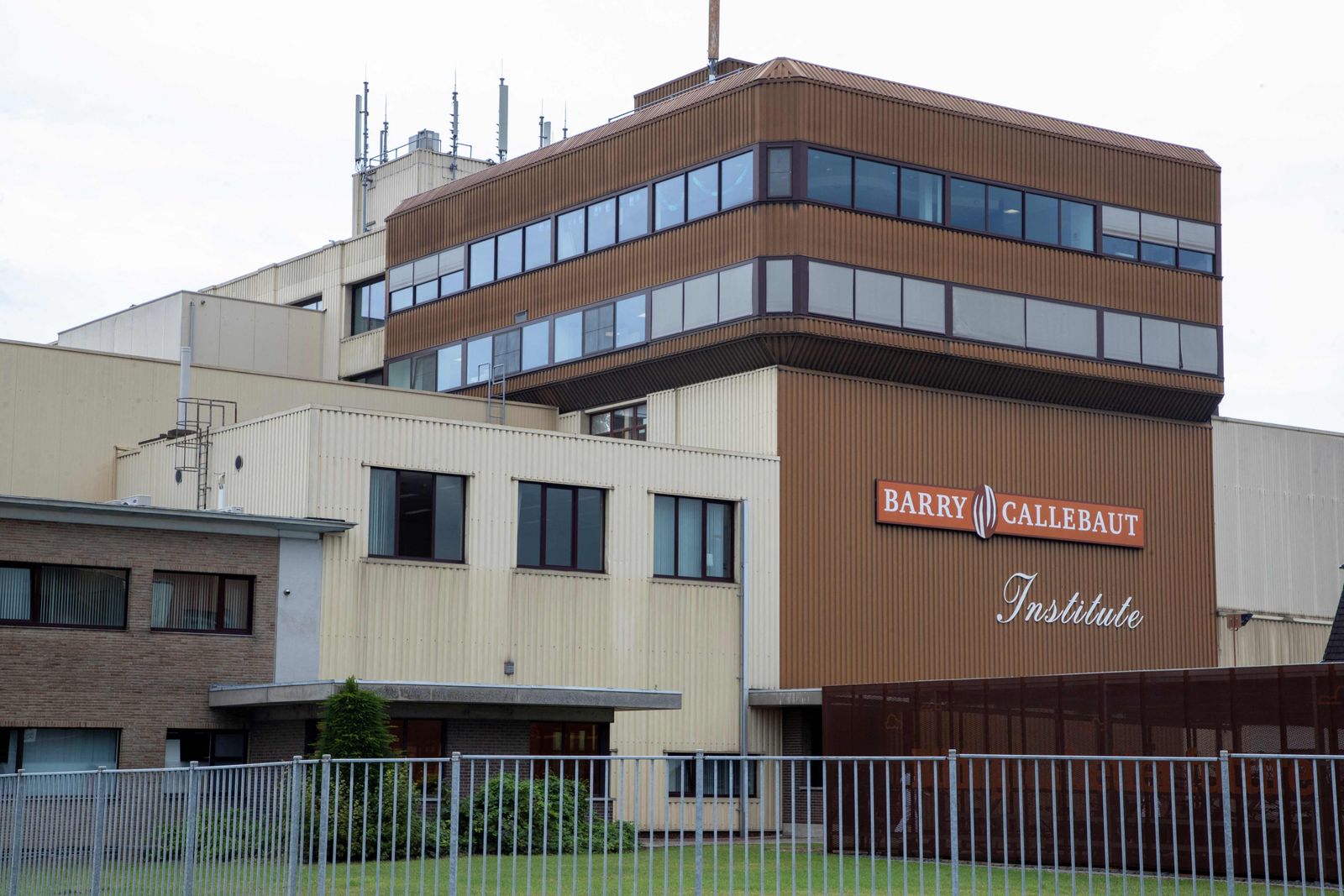 This picture taken on June 30, 2022 shows the premises of Barry Callebaut production site in Wieze, Lebbeke. - Swiss group Barry Callebaut, the world's largest cocoa and chocolate company, said on June 30, 2022, that it had halted chocolate production at its Wieze (Belgium) factory, billed as the world's largest, after salmonella was found in a batch on June 26. (Photo by NICOLAS MAETERLINCK / Belga / AFP) / Belgium OUT - AFP