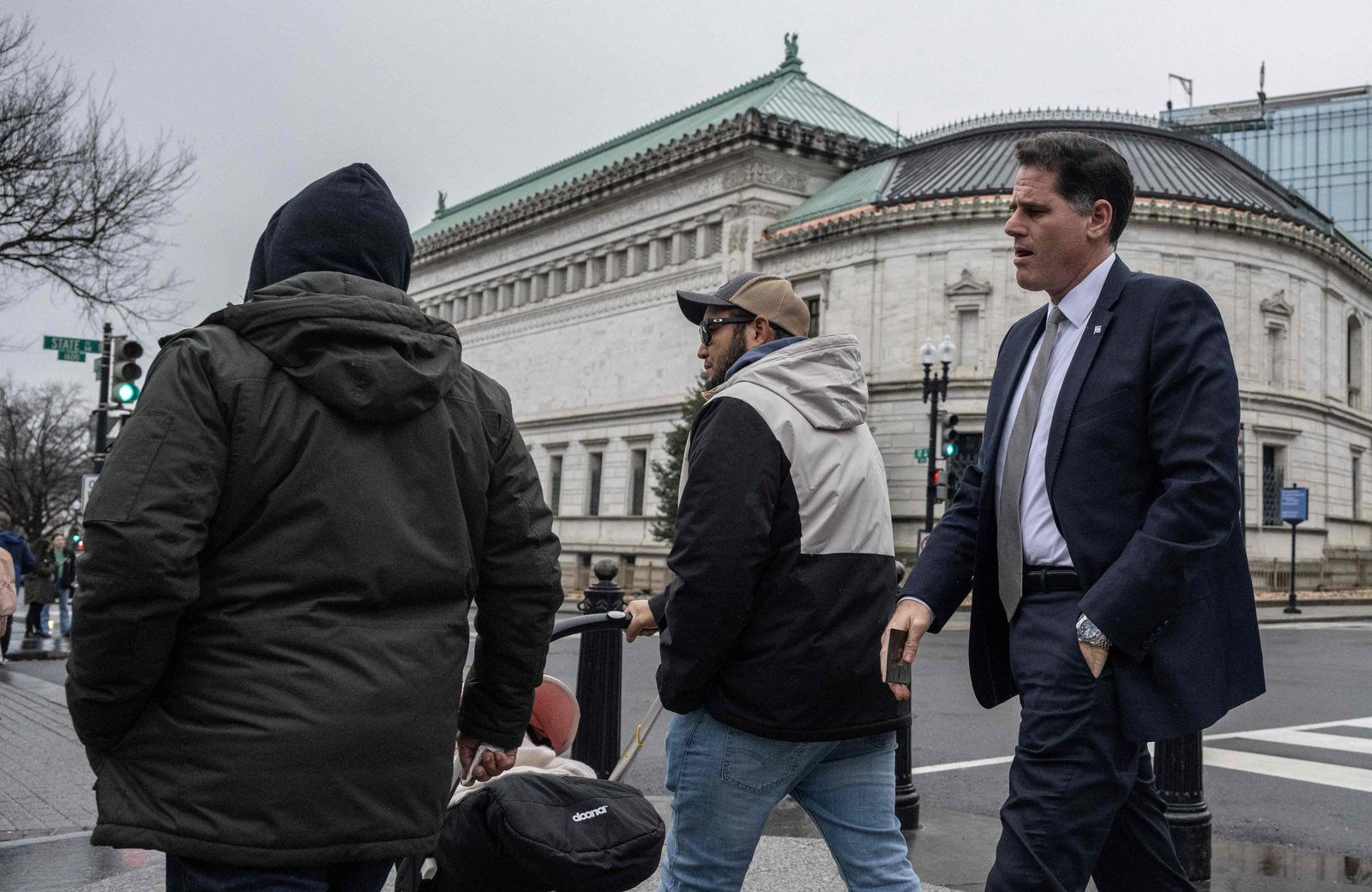 Israel's Minister for Strategic Affairs, Ron Dermer, looks on as he walks into the Executive Office Building next to the White House in Washington, DC on December 26, 2023. Dermer is in Washington to meet with US Secretary of State Tony Blinken, and National Security Advisor, Jake Sullivan, to discuss matters related to the conflict in Gaza. (Photo by ANDREW CABALLERO-REYNOLDS / AFP)