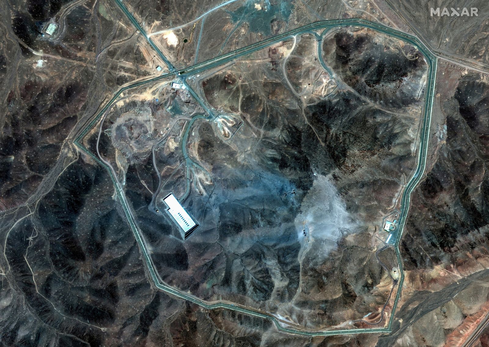 A satellite view shows an overview of Fordow underground complex, after the U.S. struck the underground nuclear facility, near Qom, Iran June 22, 2025. MAXAR TECHNOLOGIES/Handout via REUTERS THIS IMAGE HAS BEEN SUPPLIED BY A THIRD PARTY. NO RESALES. NO ARCHIVES. MANDATORY CREDIT. DO NOT OBSCURE LOGO.