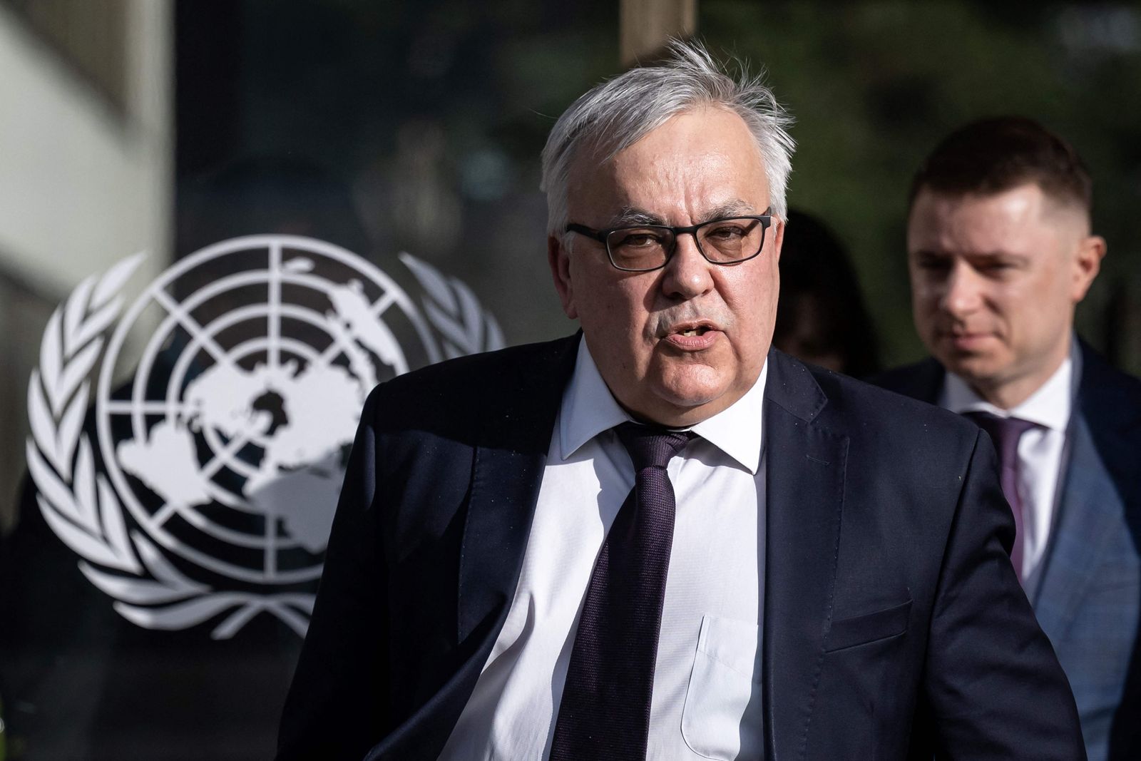 Russian Deputy Foreign Minister Sergei Vershinin leaves after talks on Black Sea Grain Initiative at the United Nations in Geneva on March 13, 2023. - The United Nations and Russia began talks on renewing the Ukraine grain export deal, which has helped ease the global food crisis triggered by Moscow's invasion of its neighbour. (Photo by Fabrice COFFRINI / AFP) - AFP