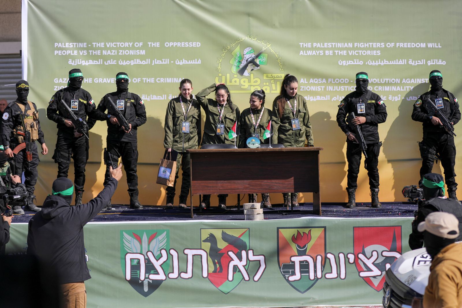 Four female Israeli soldiers, who had been held in Gaza since the deadly October 7, 2023 attack, are released by Hamas militants as part of a ceasefire and a hostages-prisoners swap deal between Hamas and Israel, in Gaza City, January 25, 2025. REUTERS/Dawoud Abu Alkas