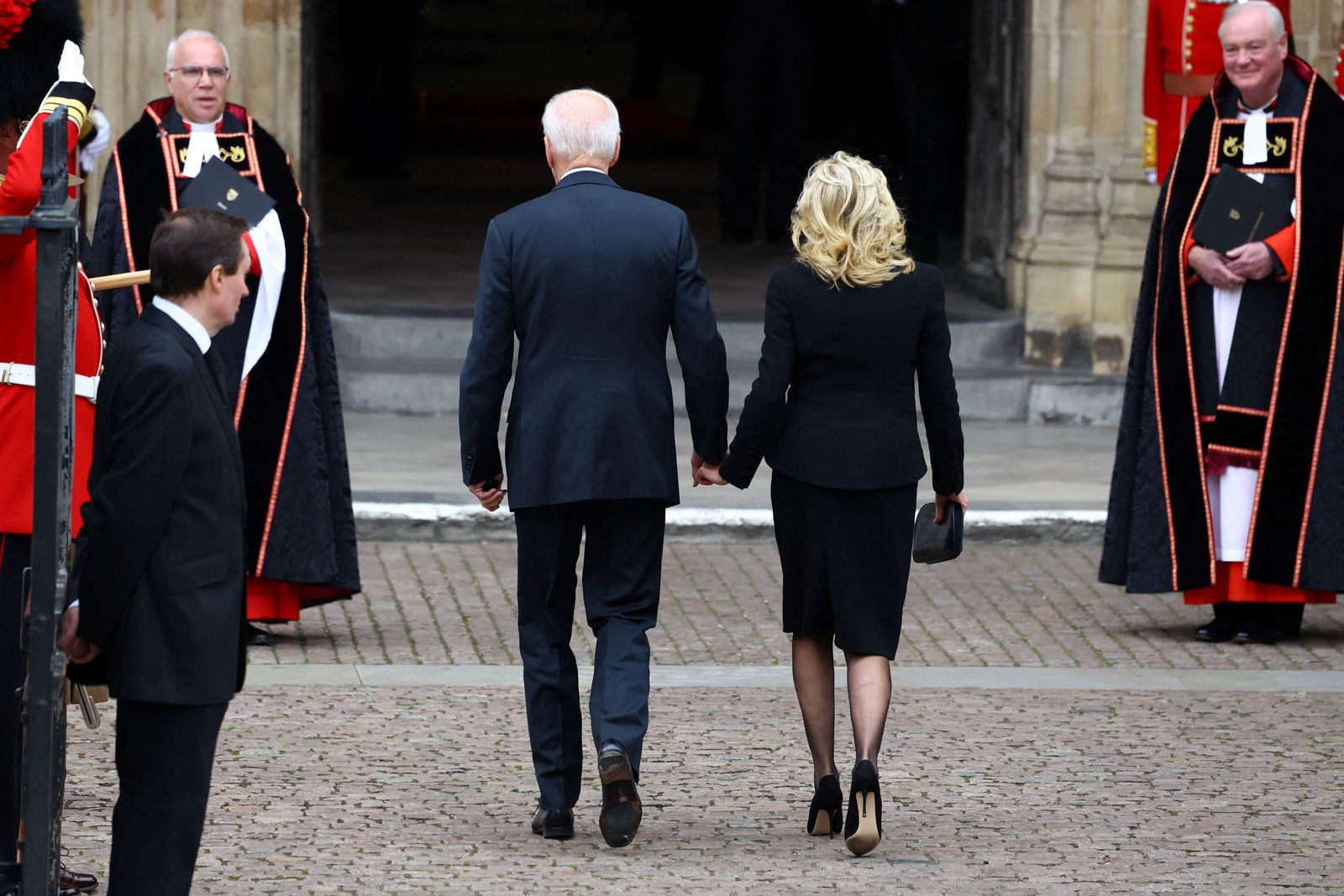 الرئيس الأميركي جو بايدن وزوجته جيل بايدن يحضران مراسم جنازة الملكة إليزابيث في كنيسة وستمنستر بلندن- 19 سبتمبر 2022 - AFP