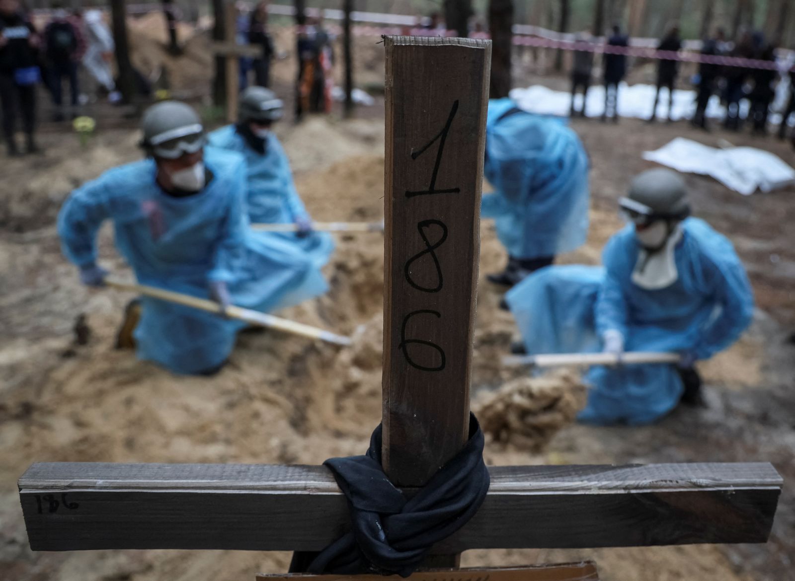 Mass burial site discovered in Izium - REUTERS