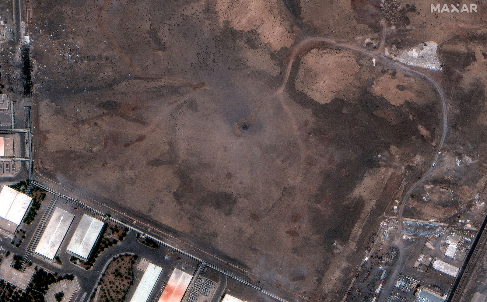 Satellite image shows a close up of a crater over the underground facility of Natanz Enrichment Facility, after it was hit by U.S. airstrikes, near Natanz, Iran, June 22, 2025. Maxar Technologies/Handout via REUTERS    THIS IMAGE HAS BEEN SUPPLIED BY A THIRD PARTY. NO RESALES. NO ARCHIVES. MANDATORY CREDIT. MUST NOT OBSCURE LOGO.