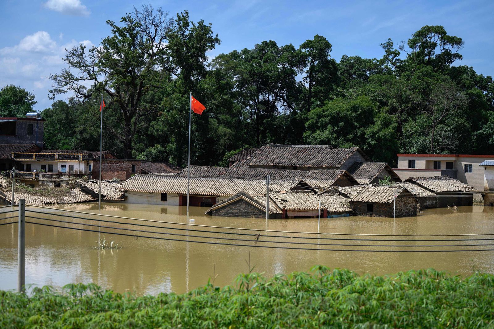 This photo shows a flooded area after heavy rains in Yingde, Qingyuan city, in China's southern Guangdong province on June 23, 2022. (Photo by AFP) / China OUT - AFP