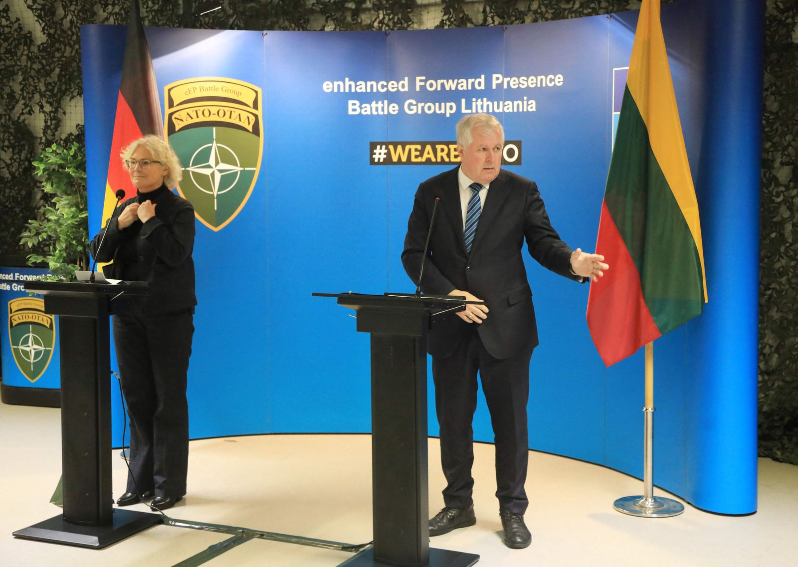 German Defence Minister Christine Lambrecht (L) and Lithuania's Minister of National Defence Arvydas Anusauskas speak at a joint press conference after meeting the NATO Enhanced Forward Presence (EFP) Battalion Battle Group in Rukla, Lithuania, on Dezember 19, 2021. - The trip to Lithuania is Lambrecht's first since being named defence minister, after new German Chancellor Olaf Scholz's Social Democrats formed a coalition government with the Greens and the liberal FDP earlier this month. (Photo by PETRAS MALUKAS / AFP) - AFP