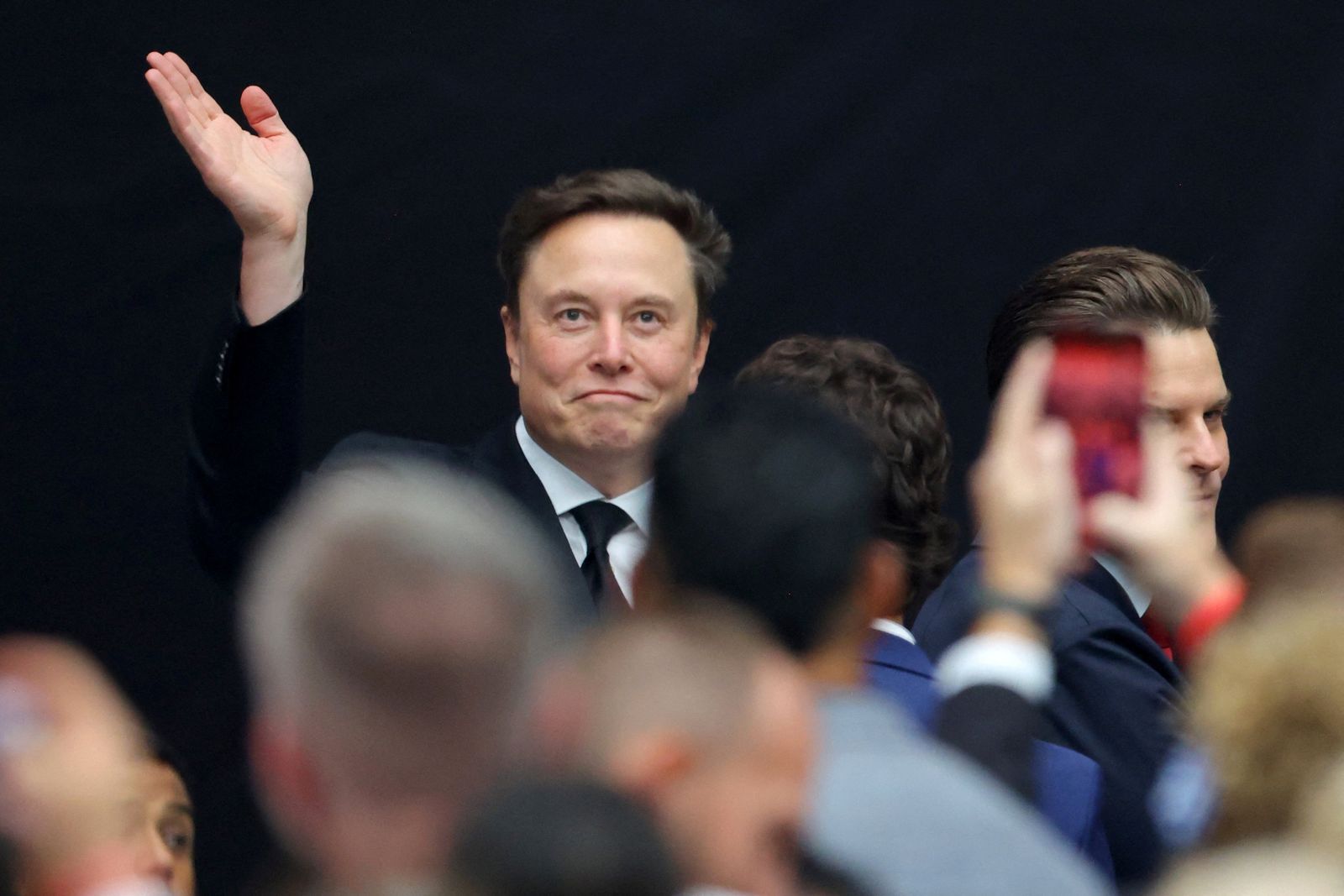 Elon Musk arrives for a memorial service for slain conservative commentator Charlie Kirk at State Farm Stadium, on the day of a memorial service for slain conservative commentator Charlie Kirk, in Glendale, Arizona, U.S., September 21, 2025.  REUTERS/Carlos Barria