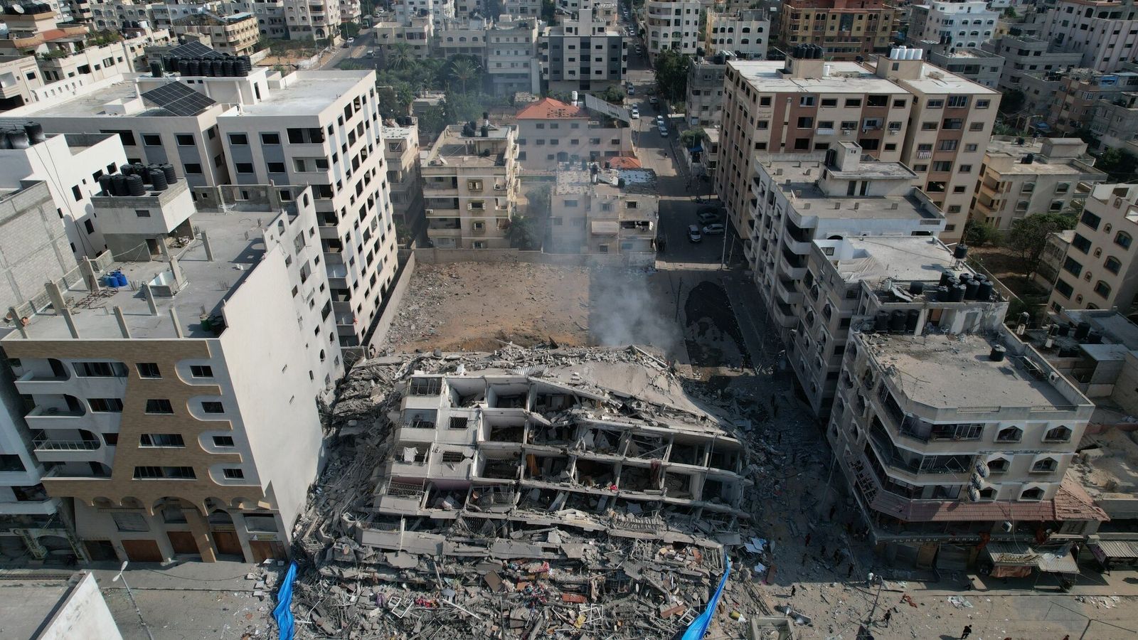 Dstroyed buildings and residential towers following an Israeli missile attack in the Rimal district of Gaza City, Gaza, on Sunday, Oct. 8. 2023. Fighting continued in southern Israel for a second day as Israeli Defence Forces sought to regain control of areas infiltrated yesterday by militants from the Gaza Strip. Photographer: Ahmad Salem/Bloomberg