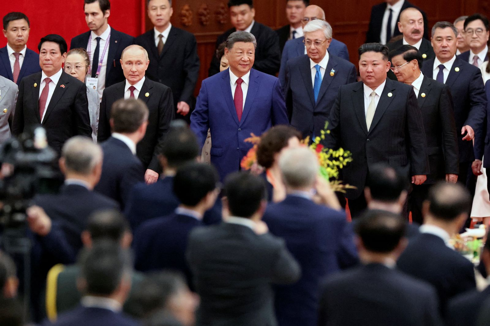 Chinese President Xi Jinping, Russian President Vladimir Putin and North Korean leader Kim Jong Un arrive for a reception marking the 80th anniversary of the end of World War Two, at the Great Hall of the People in Beijing, China September 3, 2025. REUTERS/Florence Lo