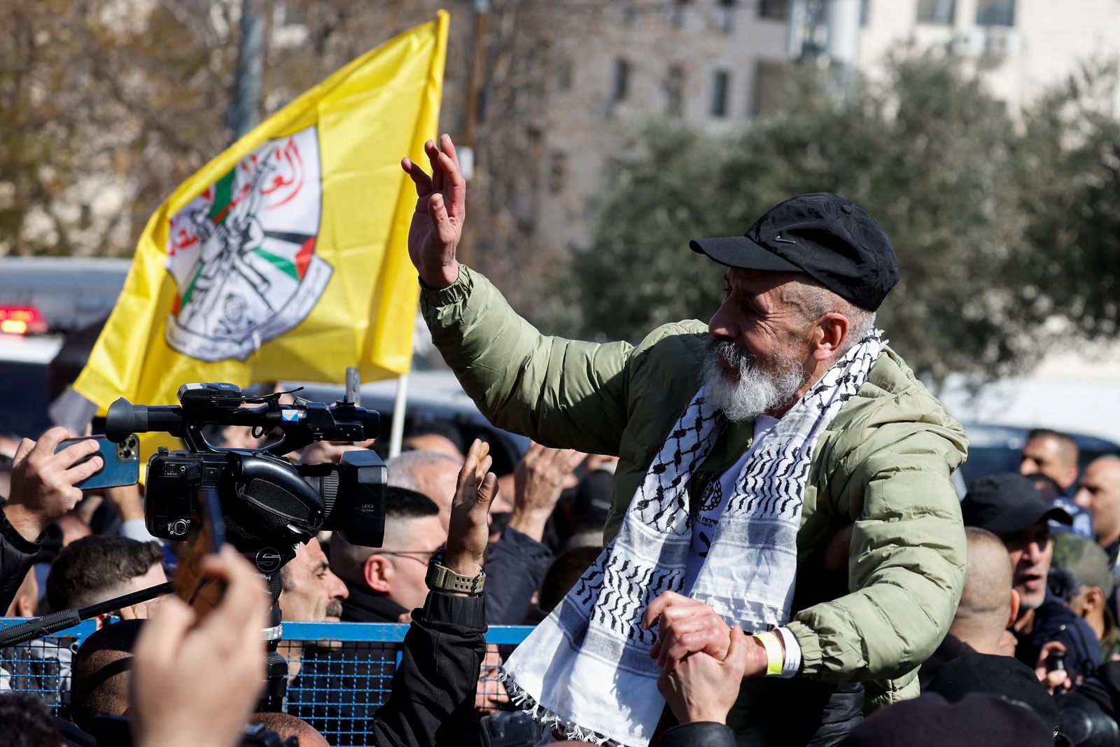 A freed Palestinian prisoner is greeted after being released from an Israeli jail as part of a hostages-prisoners swap and a ceasefire deal in Gaza between Hamas and Israel, in Ramallah, in the Israeli-occupied West Bank, February 15, 2025. REUTERS/Mohammed Torokman     TPX IMAGES OF THE DAY