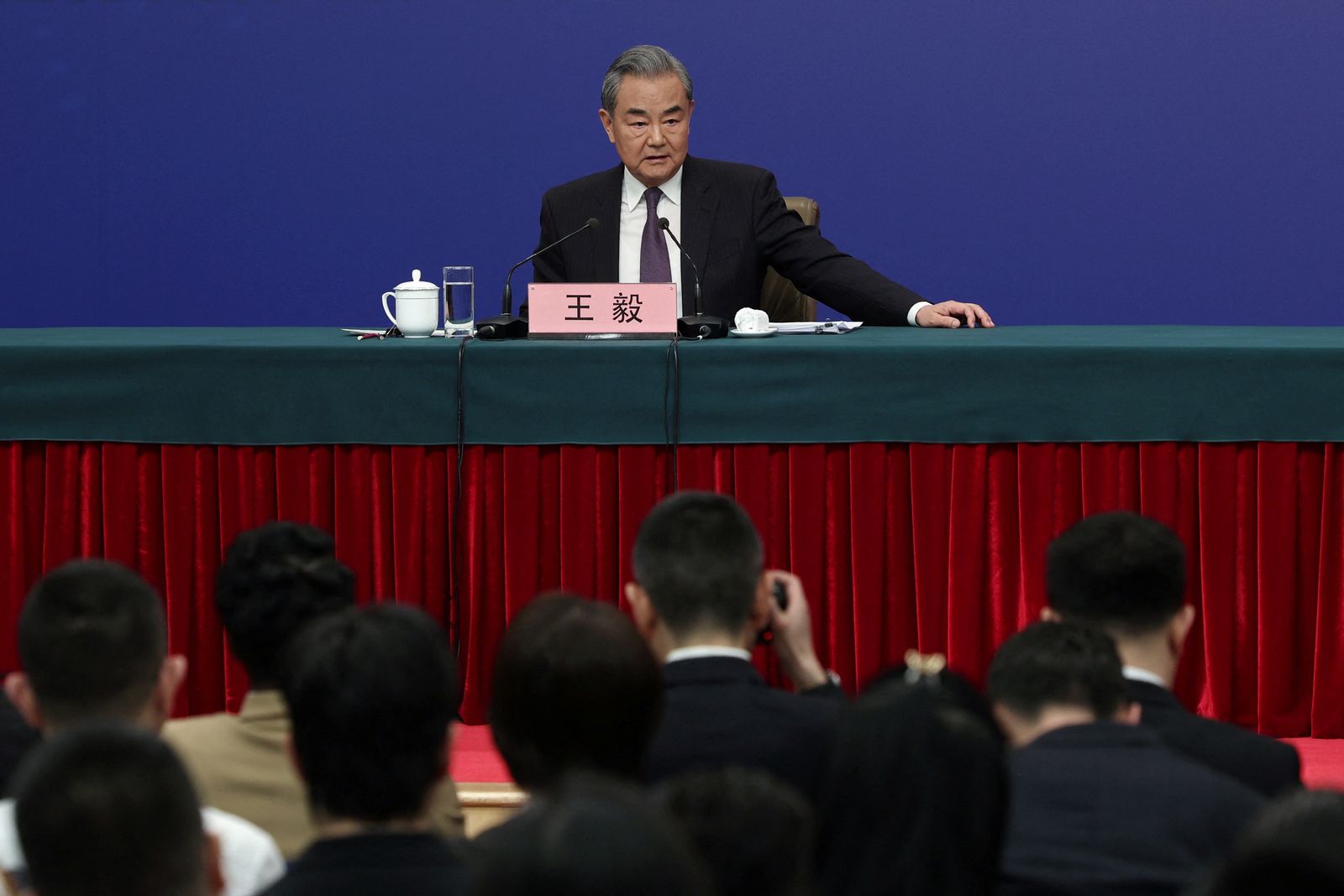 Chinese Foreign Minister Wang Yi speaks at a press conference on the sidelines of the National People's Congress (NPC) in Beijing, China March 7, 2025. REUTERS/Go Nakamura