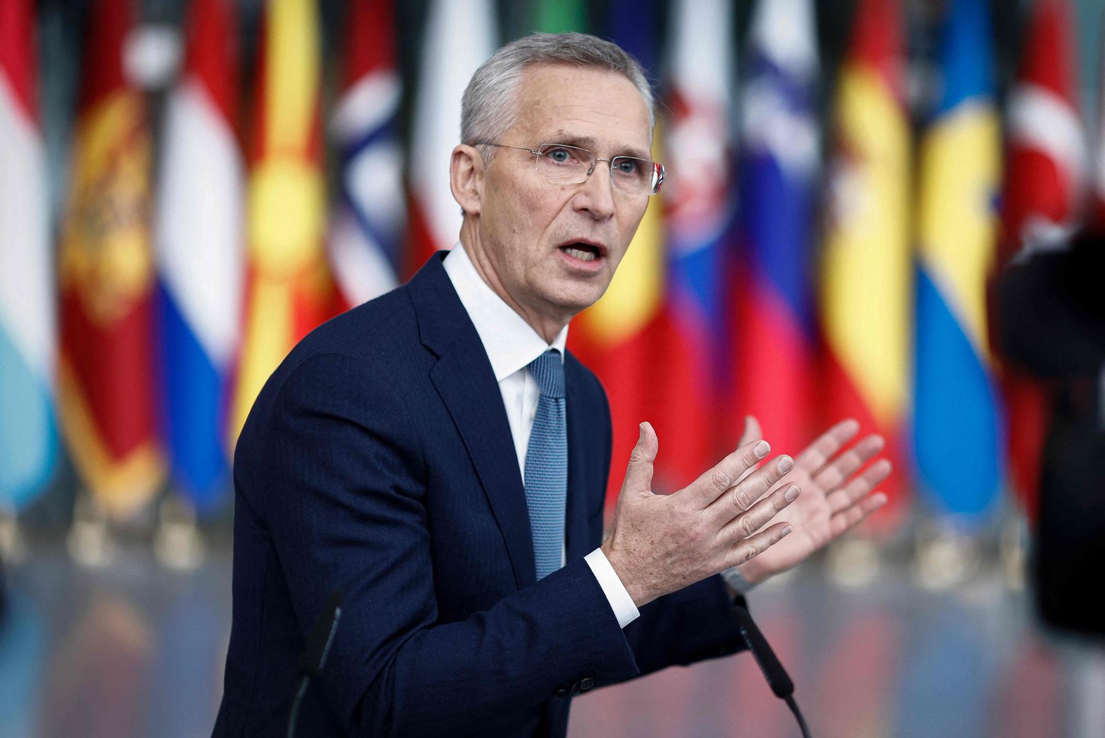 Secretary General of NATO Jens Stoltenberg addresses media during a statement ahead of a NATO foreign ministers meeting at NATO headquarters in Brussels, on April 3, 2024. The NATO military alliance on April 4, 2024, marks the 75th anniversary of the signing of its founding treaty in Washington. (Photo by Kenzo TRIBOUILLARD / AFP)