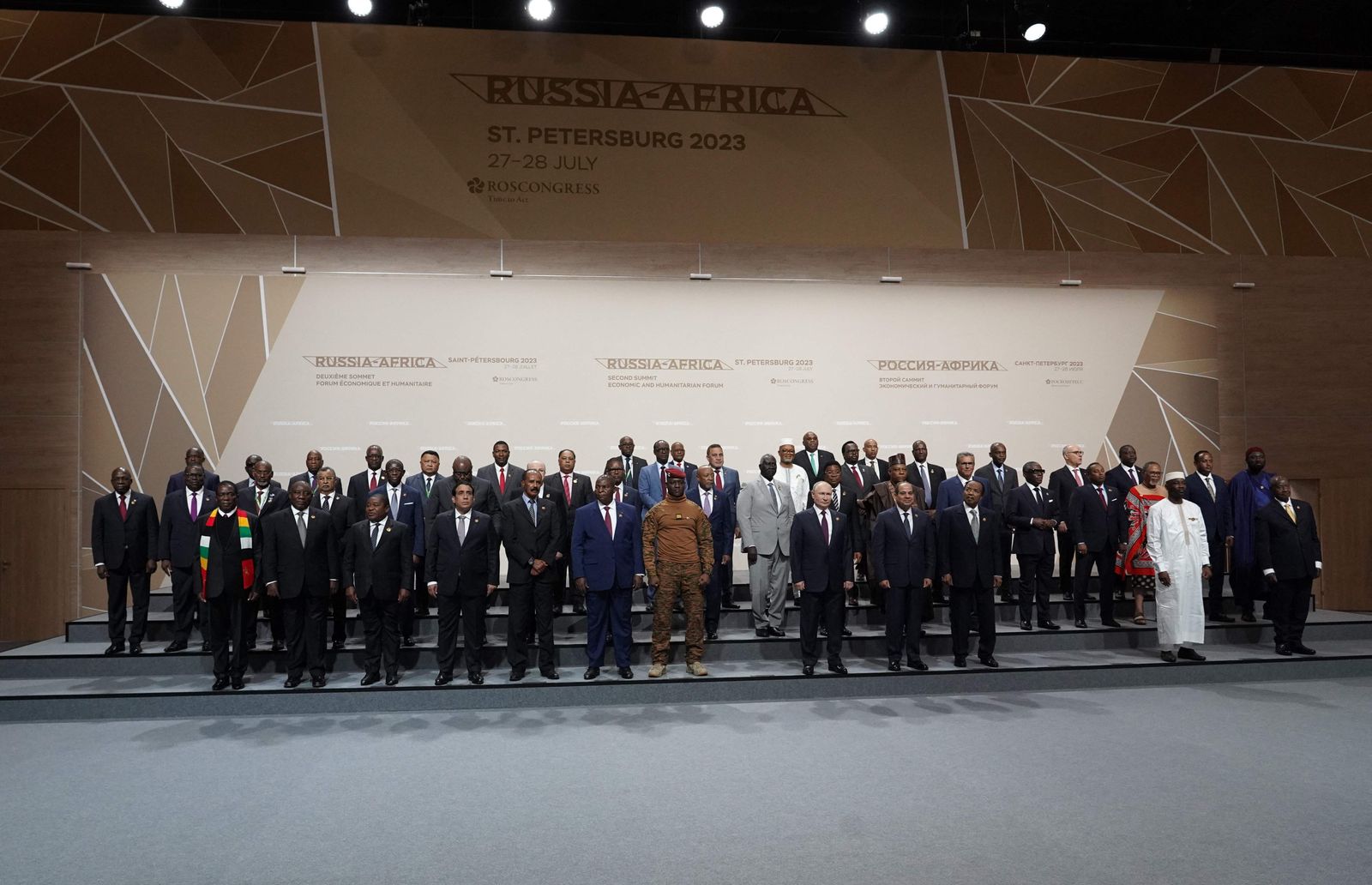 This pool image distributed by Sputnik agency shows Russian President Vladimir Putin, African leaders and heads of delegations posing for a family photo at the second Russia-Africa summit in Saint Petersburg on July 28, 2023. (Photo by Alexey DANICHEV / POOL / AFP) - AFP