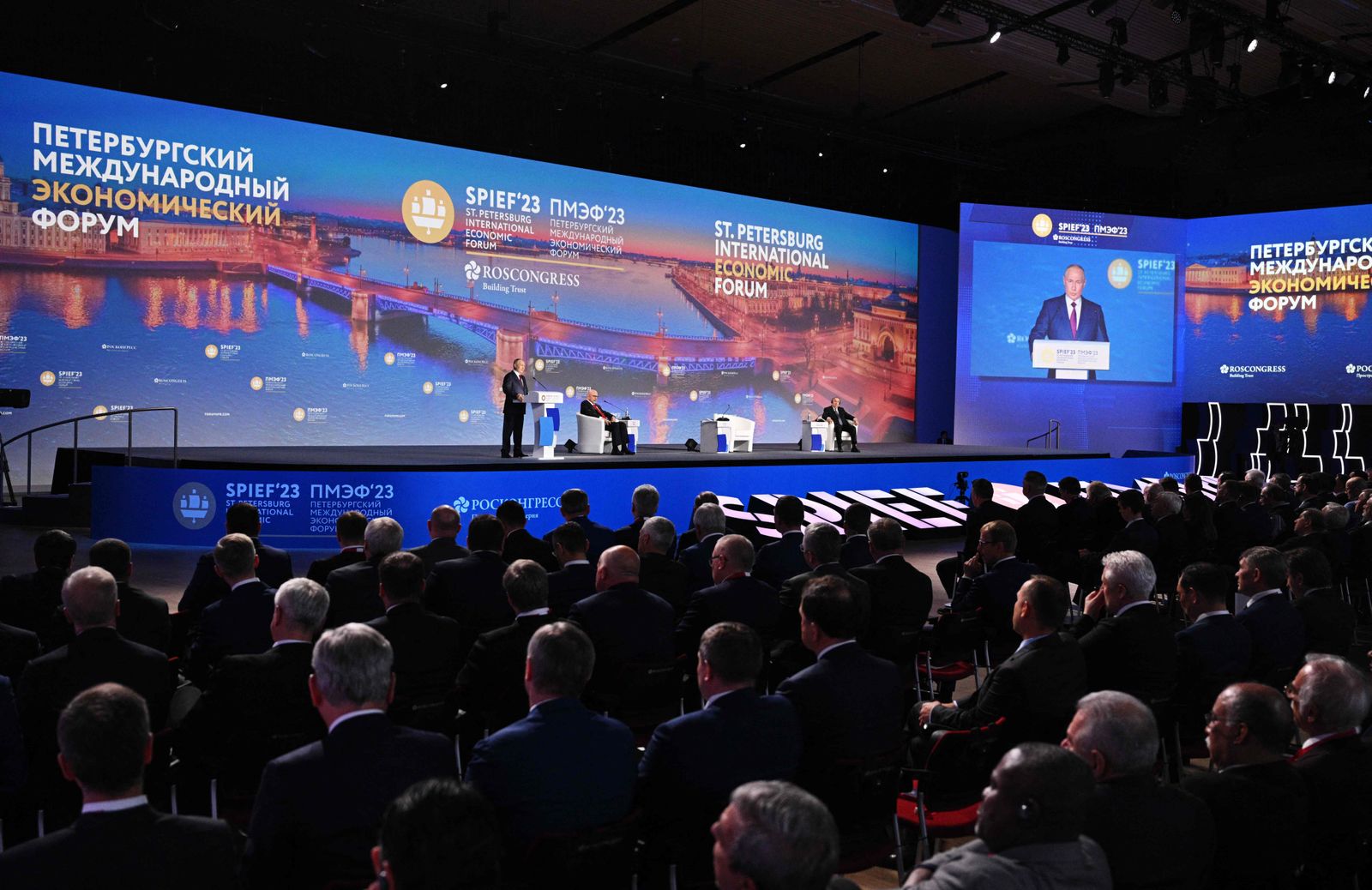 Russian President Vladimir Putin gives a speech at a plenary session of the Saint Petersburg International Economic Forum (SPIEF) in Saint Petersburg on June 16, 2023. (Photo by Ramil Sitdikov / Host photo agency RIA Novosti / AFP) / RESTRICTED TO EDITORIAL USE - MANDATORY CREDIT 