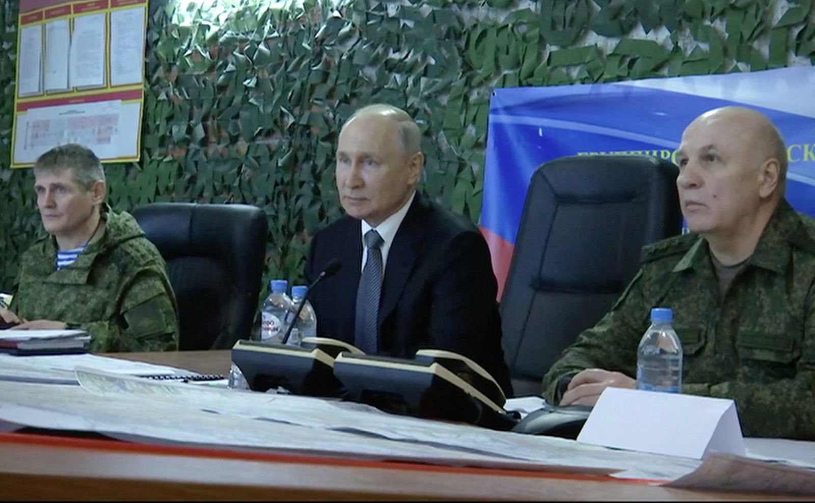 This screen grab taken from a footage released by the Russian presidential press office on April 18, 2023 shows Russian President Vladimir Putin visiting the headquarters of the Dniepr military grouping in the Kherson region of Ukraine, which is partly controlled by Russian troops. (Photo by Handout / RUSSIAN PRESIDENTIAL PRESS OFFICE / AFP) / RESTRICTED TO EDITORIAL USE - MANDATORY CREDIT 